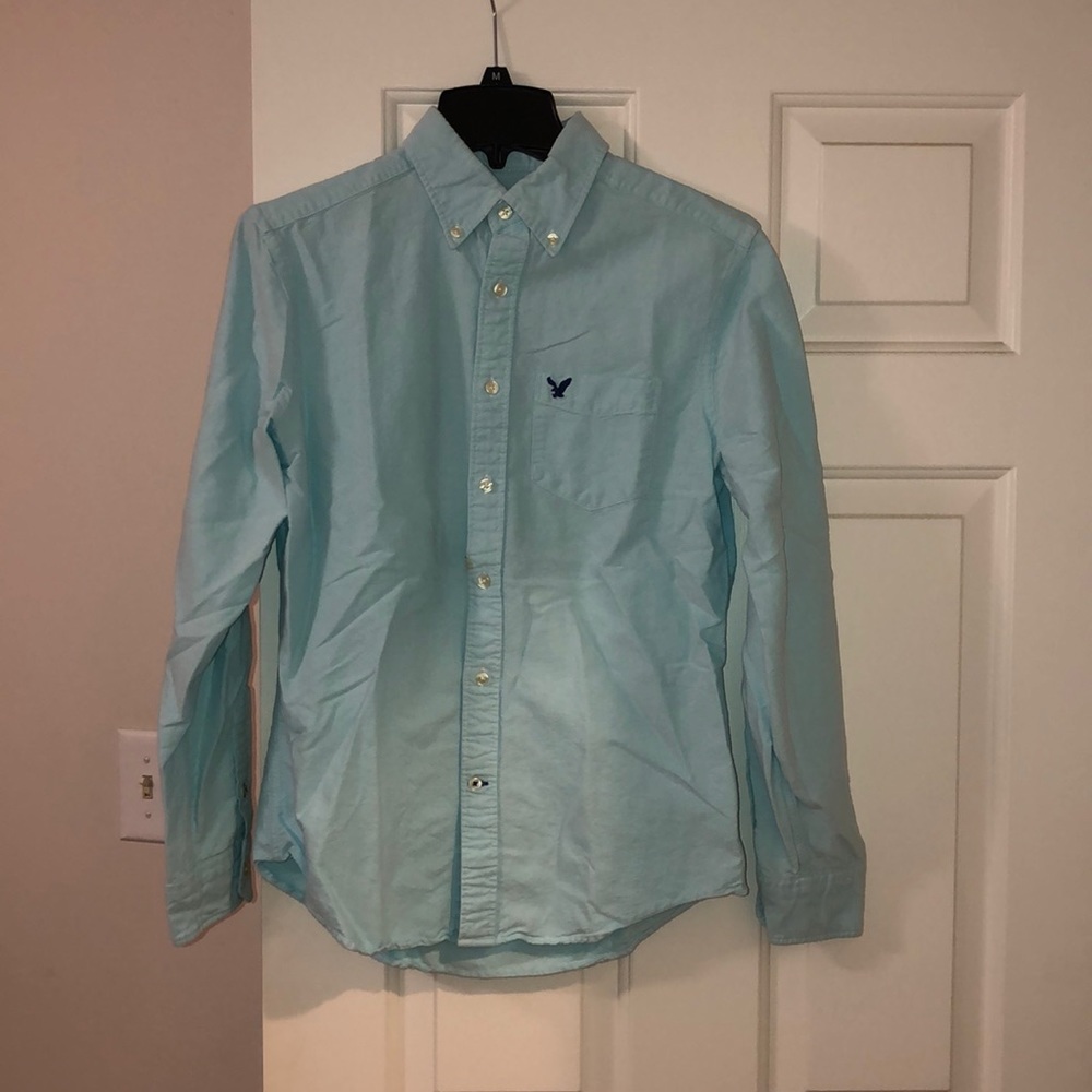 teal button down shirt